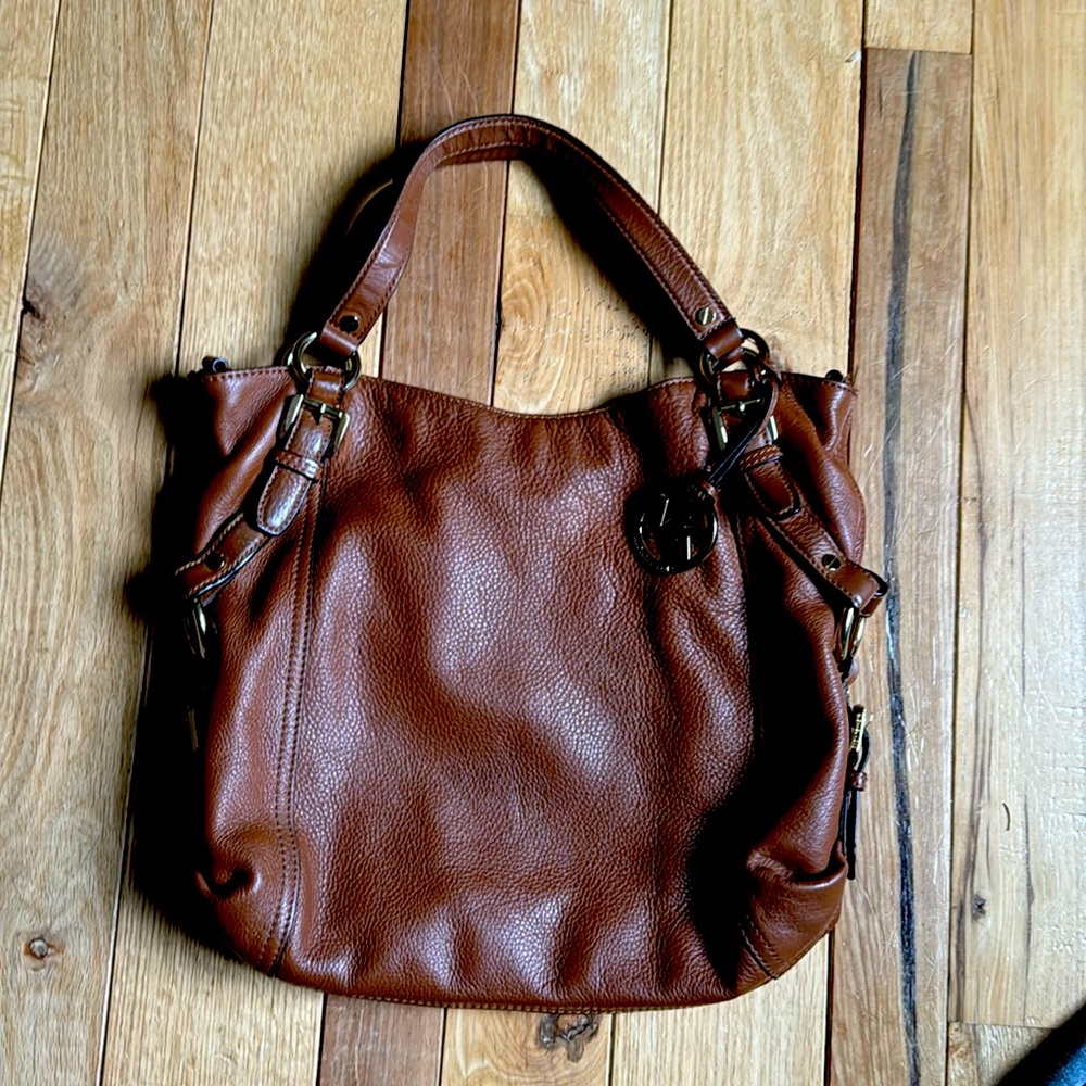 Soft pebble grain leather. Excellent condition.